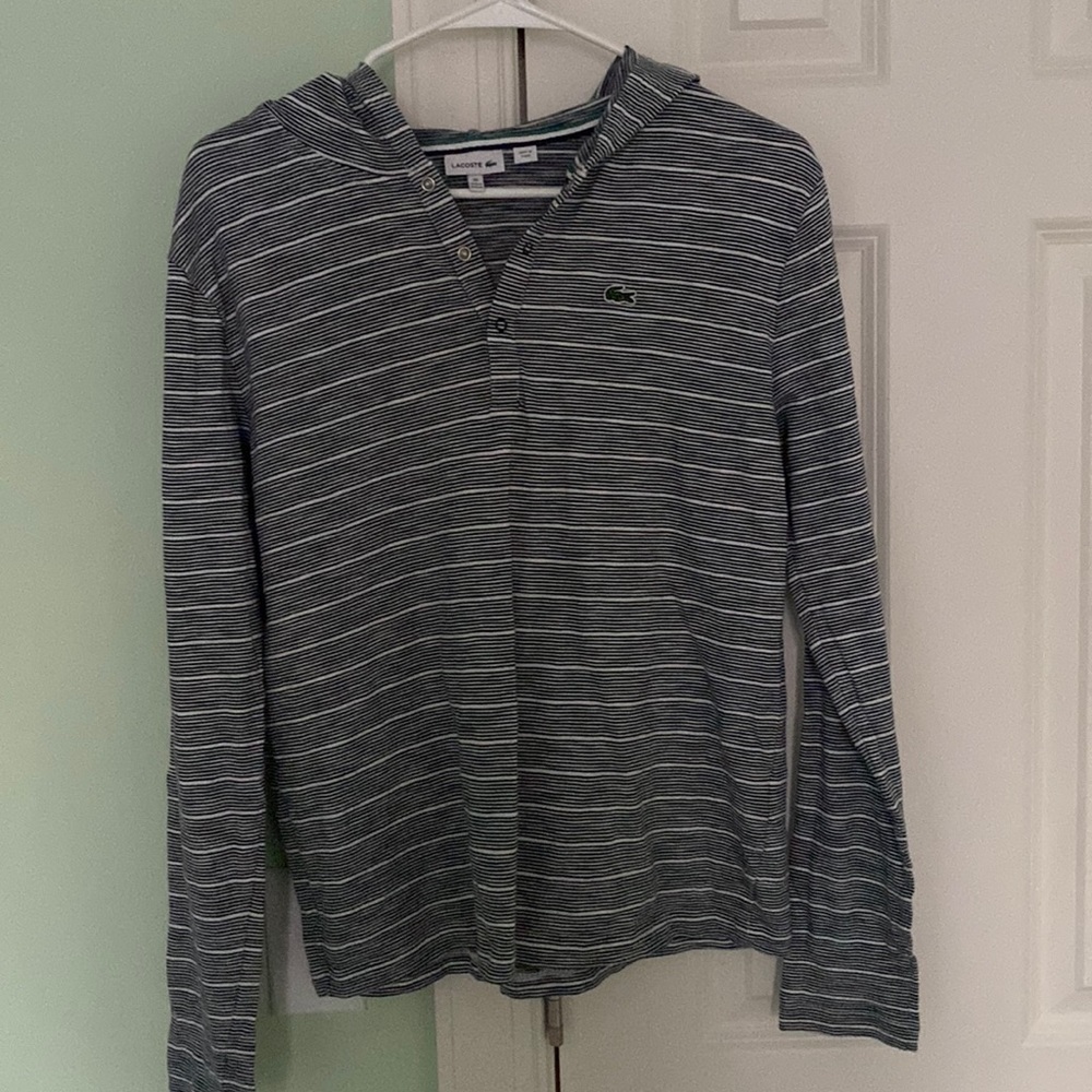Lacoste boys long sleeve shirt with hood.
